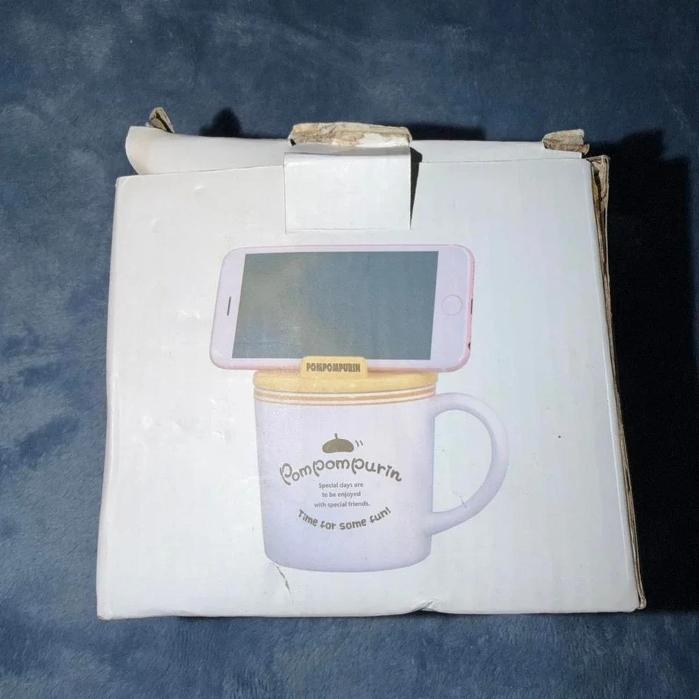 Pompompurin phone stand mug